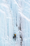 Ice climber on Weeping Wall - Banff National Park, Canada
