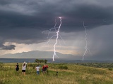 Storm chasers photographing lightning - Sonoita, Arizona
