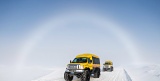 Fogbow over snow coaches - Yellowstone National Park, Wyoming