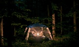 Couple reading by lantern light - Great Smoky Mountains National Park, Tennessee